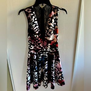 Bebe “Passion” sleeveless lace and scuba dress.